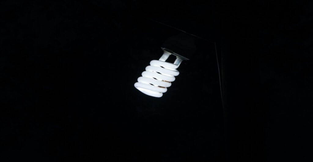 Image of a light bulb on a black background